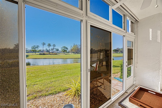 entryway featuring a water view