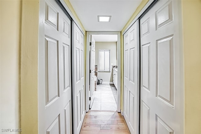 hallway featuring light hardwood / wood-style flooring