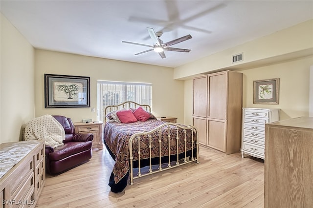 bedroom featuring ceiling fan and light wood-type flooring