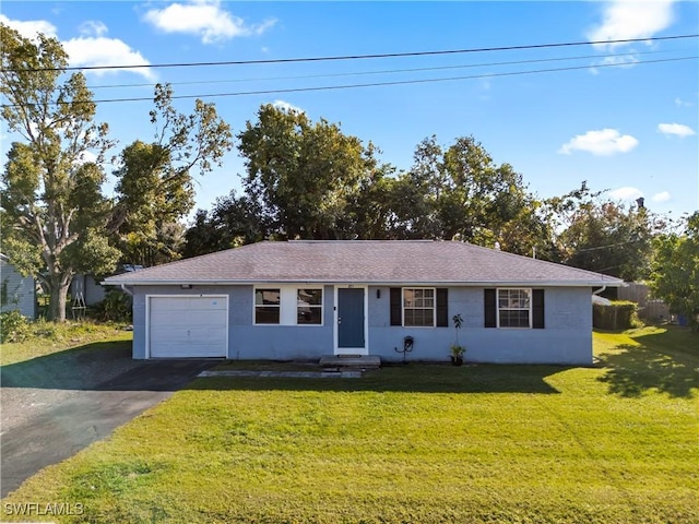 ranch-style house with a garage and a front yard