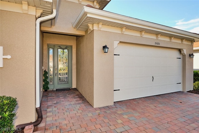 property entrance featuring a garage