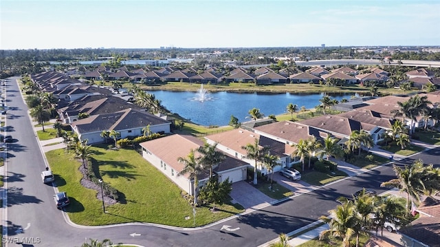 drone / aerial view featuring a water view