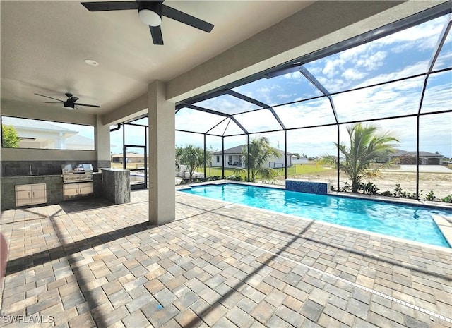 view of pool featuring a patio area, area for grilling, grilling area, a lanai, and ceiling fan