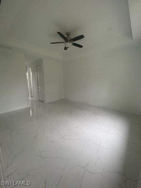 empty room featuring ceiling fan