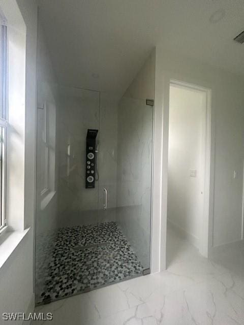 bathroom with an enclosed shower