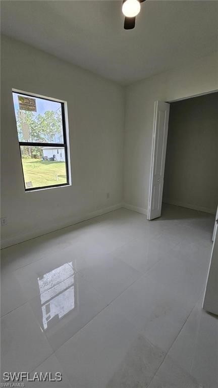 empty room with baseboards