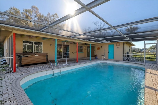 view of pool with a patio area, a hot tub, and ceiling fan