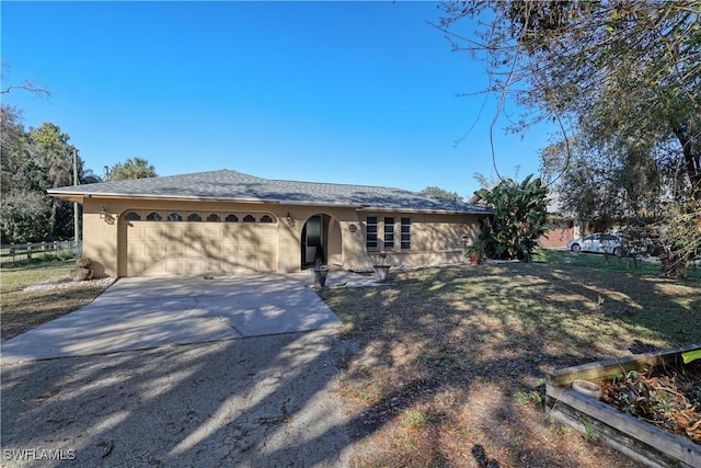 single story home with a garage