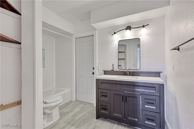 full bathroom featuring vanity, toilet, and shower / bathing tub combination