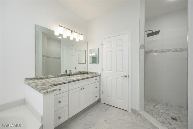 bathroom with vanity and plus walk in shower