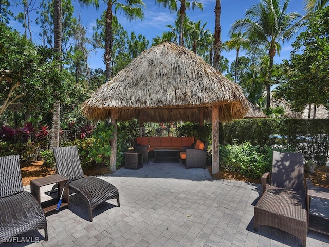 view of patio featuring a gazebo and an outdoor hangout area