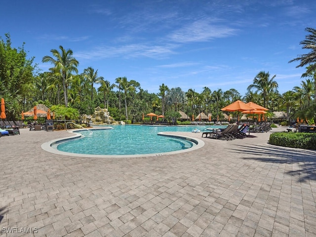 view of swimming pool with a gazebo and a patio