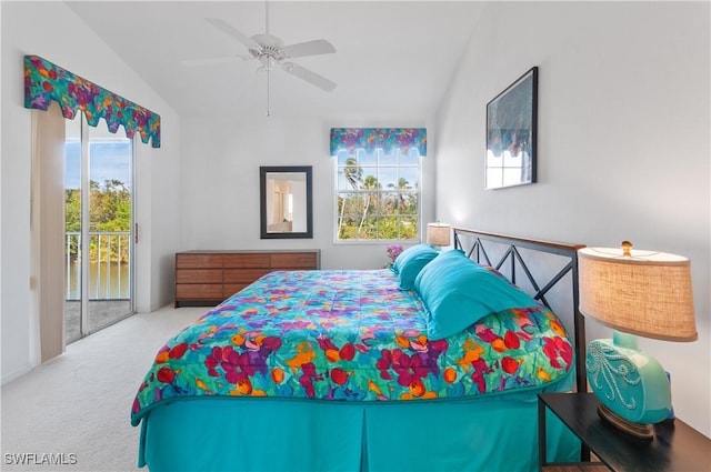 carpeted bedroom featuring lofted ceiling, access to outside, and ceiling fan