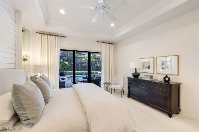 bedroom featuring a raised ceiling, ornamental molding, access to outside, and light colored carpet