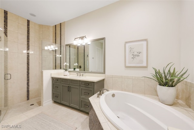 bathroom featuring vanity, separate shower and tub, and tile patterned flooring