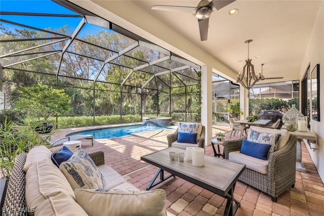 view of swimming pool featuring an outdoor living space, a lanai, a patio area, and an in ground hot tub