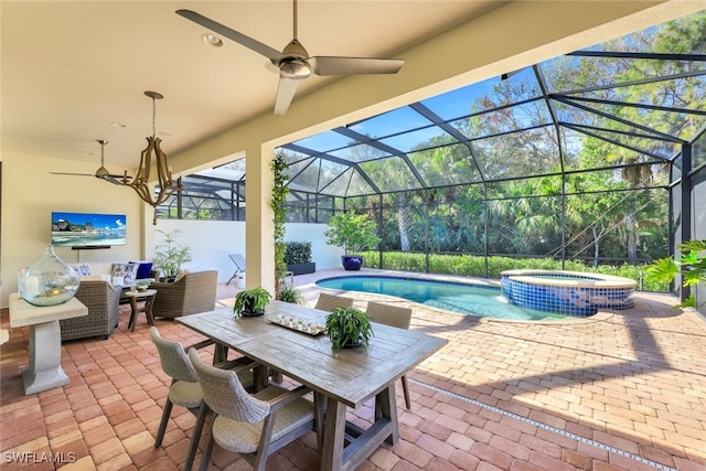 view of swimming pool featuring an in ground hot tub, an outdoor hangout area, glass enclosure, and a patio