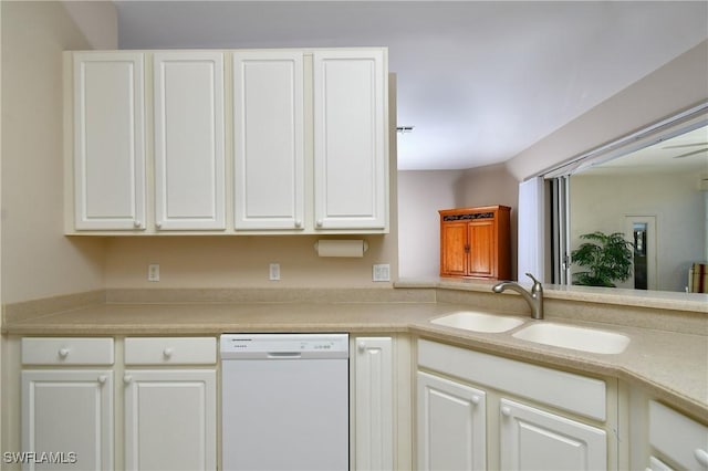 kitchen with white cabinetry, dishwasher, and sink