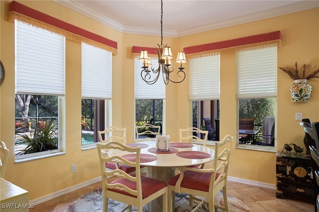 dining space with ornamental molding and a chandelier