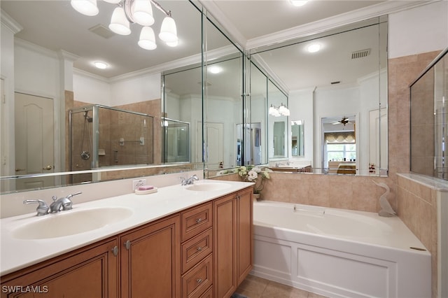 bathroom featuring tile patterned flooring, vanity, crown molding, and separate shower and tub