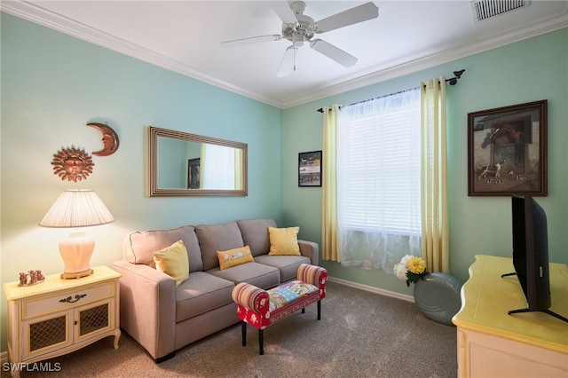 living room with carpet floors, ornamental molding, and ceiling fan