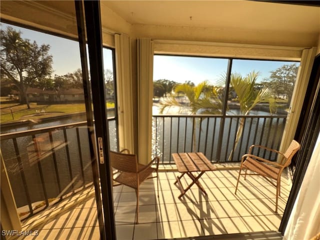 sunroom with a water view