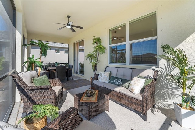 exterior space featuring an outdoor hangout area and ceiling fan