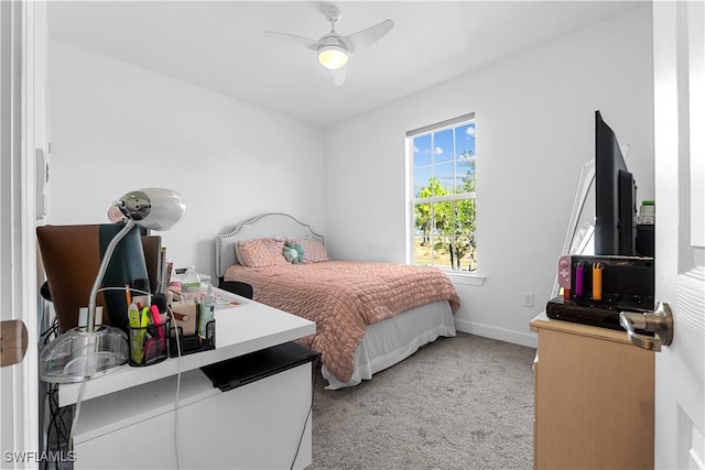 carpeted bedroom featuring ceiling fan