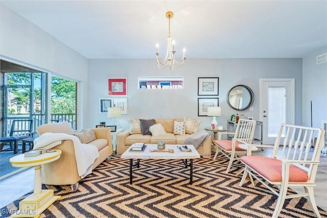 living room featuring an inviting chandelier