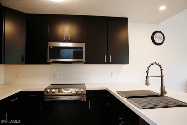 kitchen featuring stainless steel appliances and sink