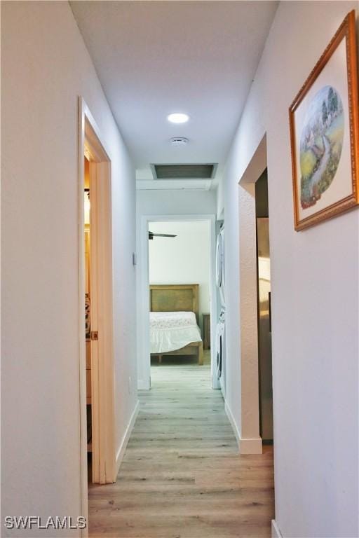 corridor featuring light wood-type flooring