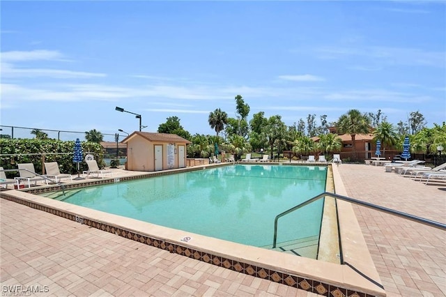 view of swimming pool featuring a patio area