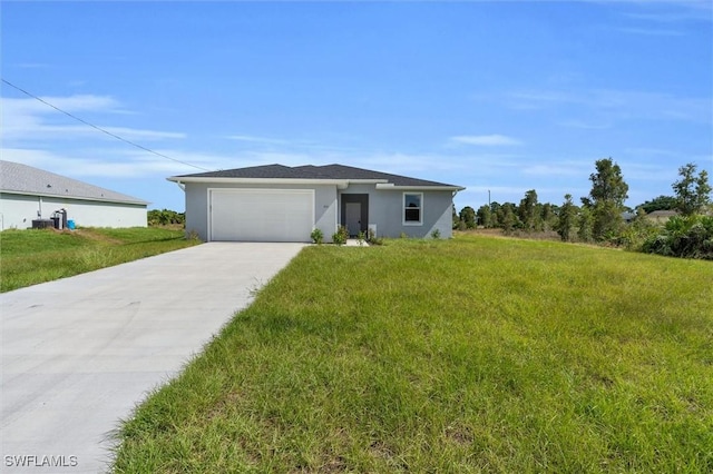 view of front of property featuring a garage, concrete driveway, a front lawn, and stucco siding