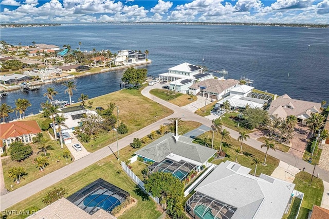 aerial view featuring a water view and a residential view