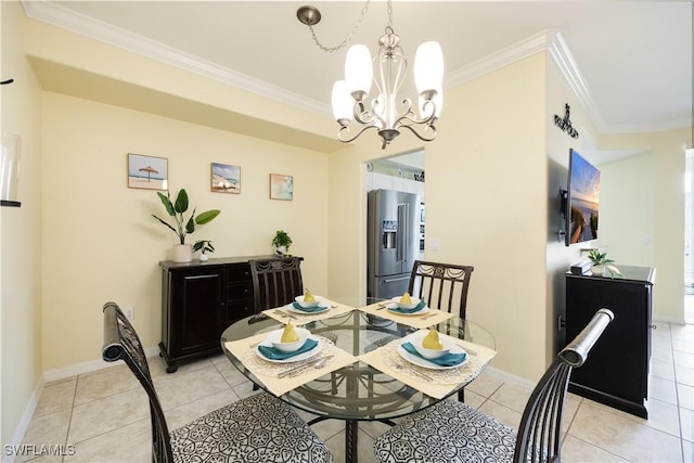 dining space featuring an inviting chandelier, light tile patterned floors, baseboards, and crown molding