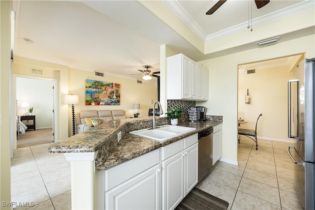 kitchen featuring light tile patterned floors, visible vents, appliances with stainless steel finishes, ornamental molding, and a sink