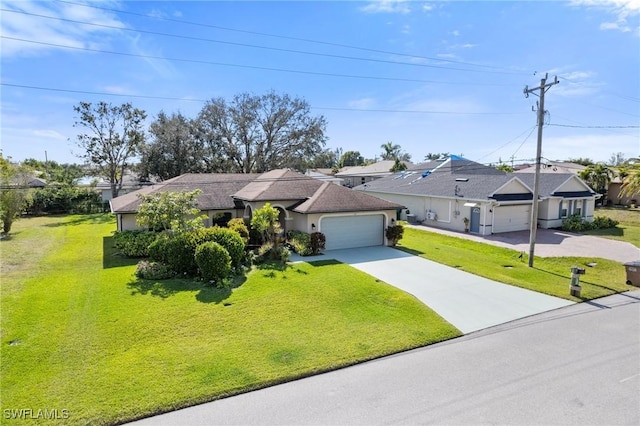 single story home featuring a garage and a front yard