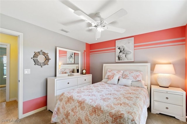 carpeted bedroom featuring ceiling fan