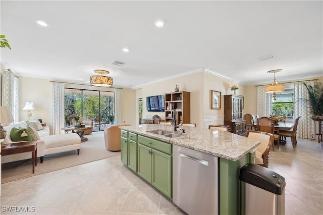 kitchen with sink, hanging light fixtures, a kitchen island with sink, stainless steel dishwasher, and green cabinets