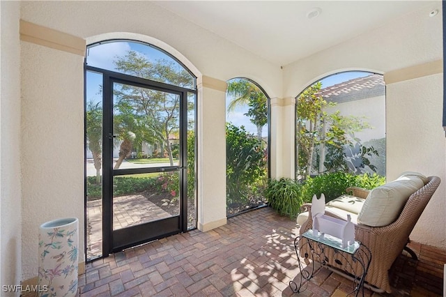 sunroom with plenty of natural light