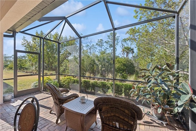 view of patio / terrace with glass enclosure