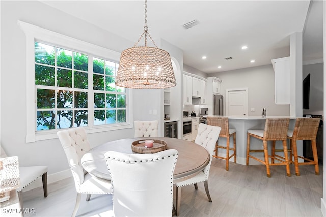 dining room featuring light wood-type flooring