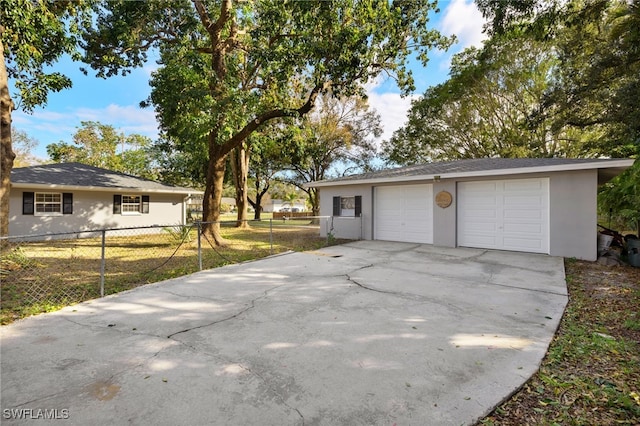 garage with a yard