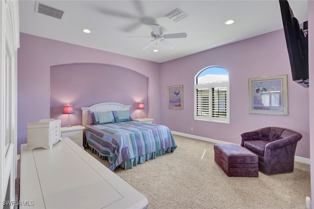 bedroom featuring ceiling fan and carpet