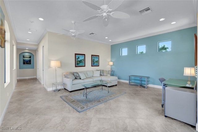 living room featuring ornamental molding and ceiling fan