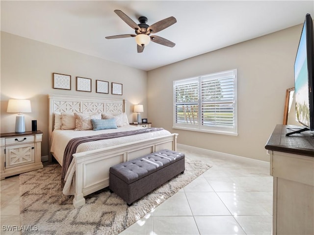 bedroom featuring ceiling fan and light tile patterned floors