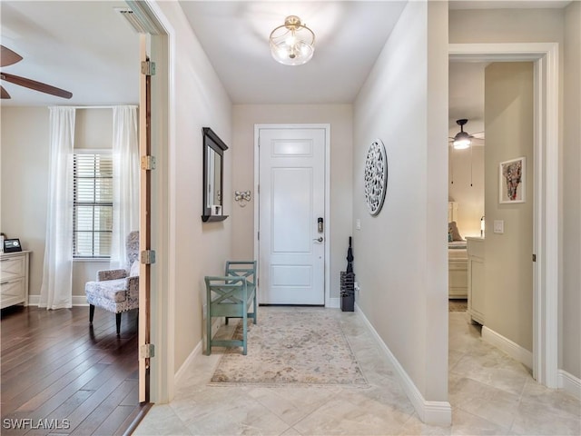 entryway featuring ceiling fan