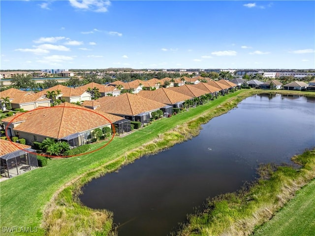 bird's eye view with a water view