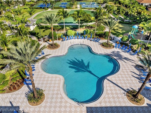 view of swimming pool with a patio