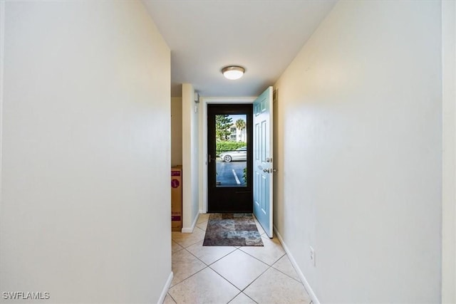 entryway featuring light tile patterned floors